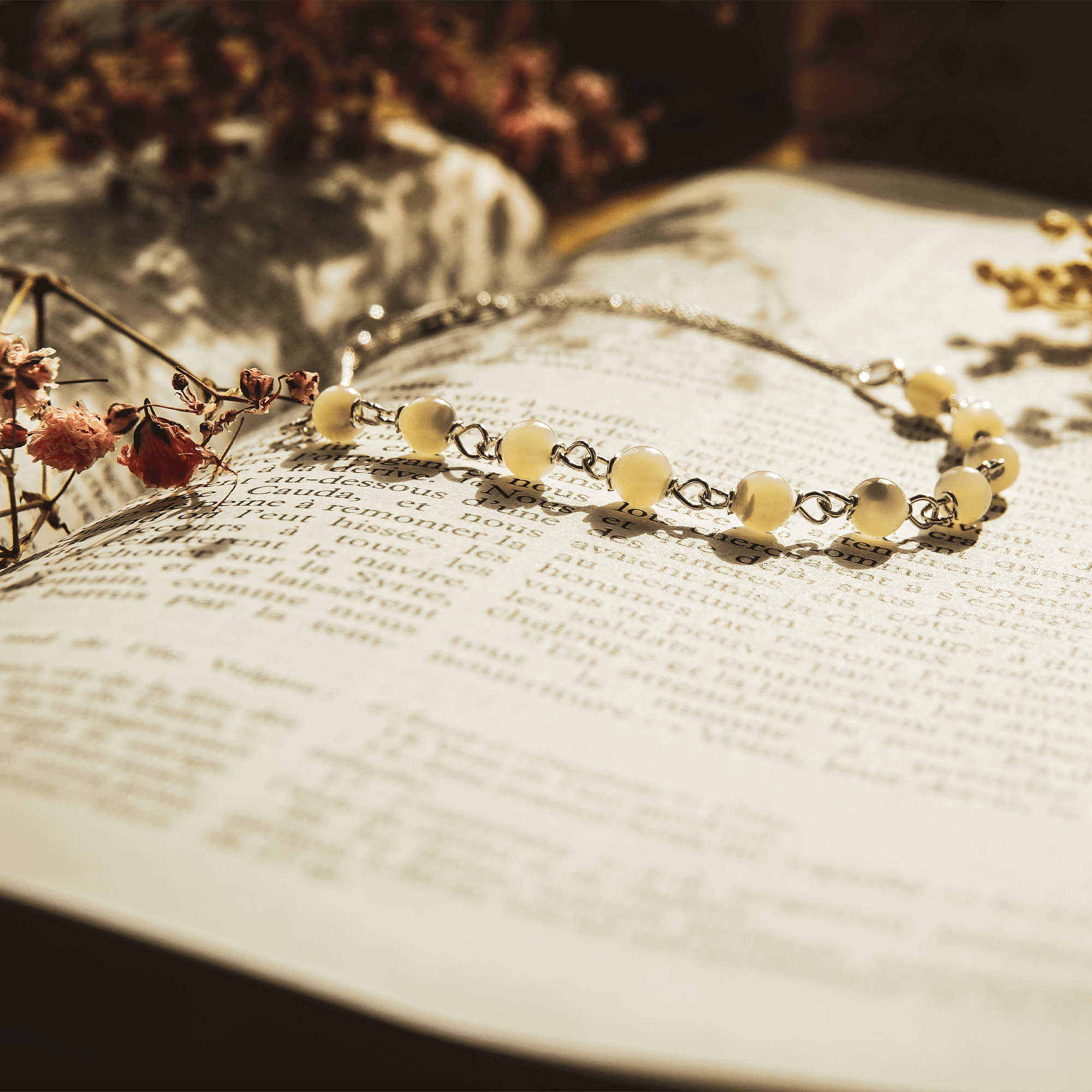 Dizainier en argent et perles de nacre