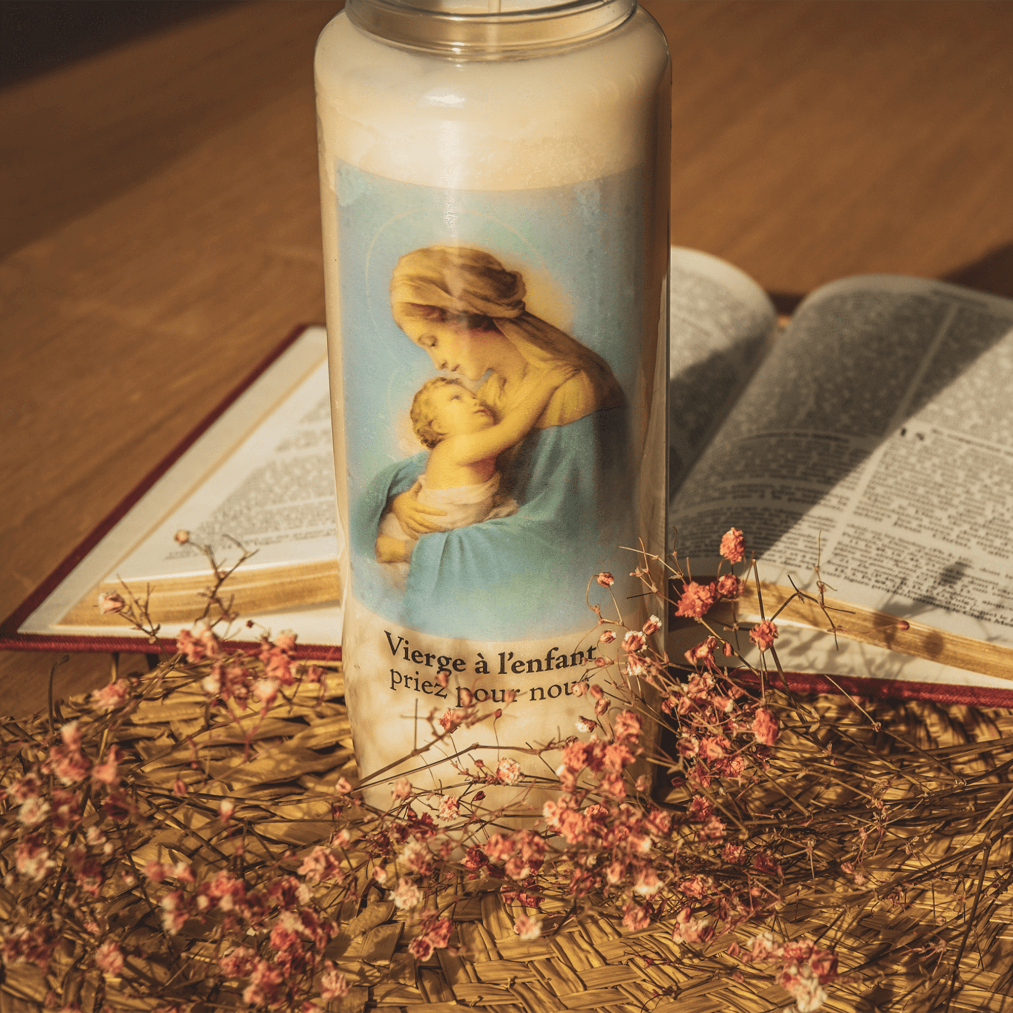 Bougie neuvaine qui accompagne vos prières pour Vierge à l'enfant