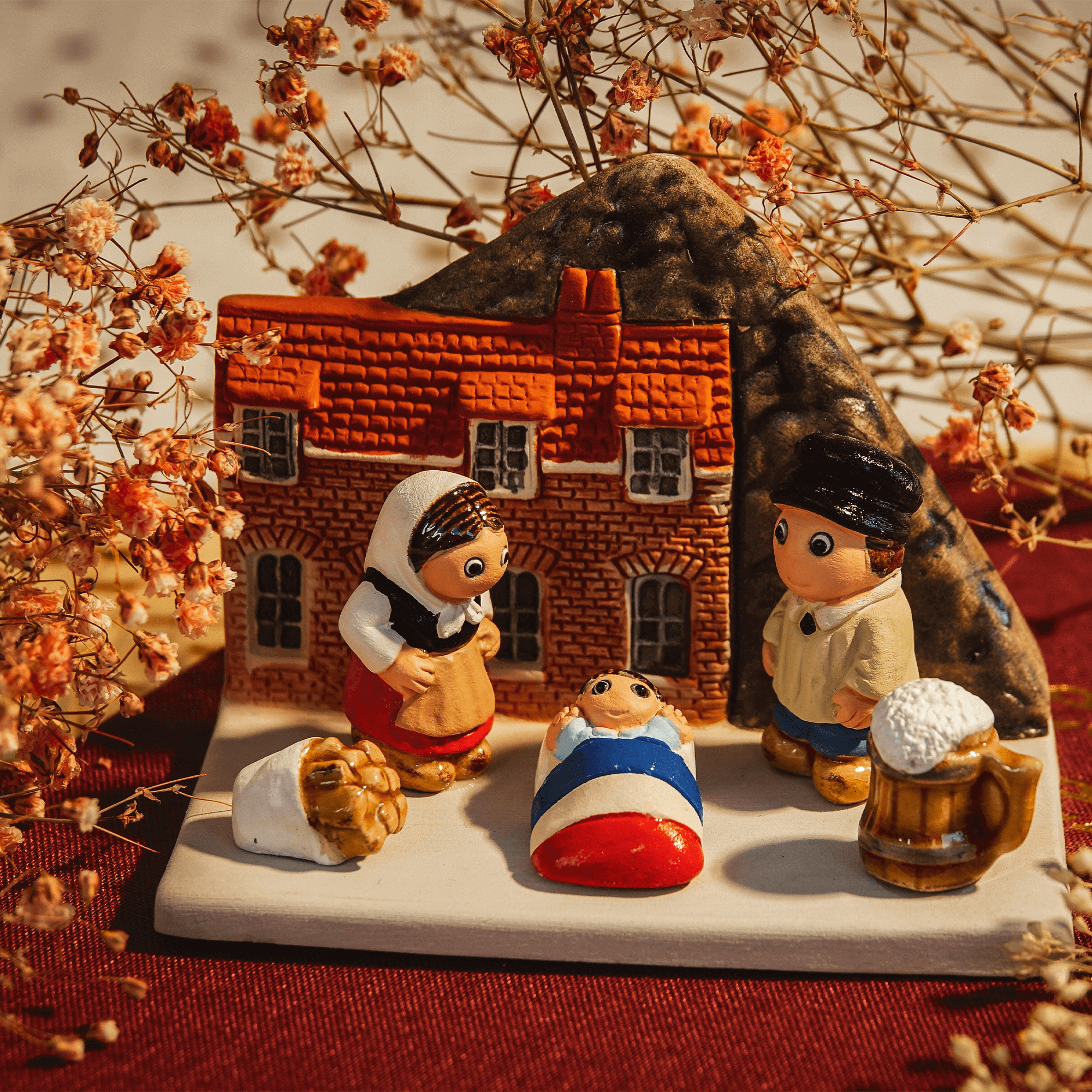 Crèche du Monde - Ch'ti. Collection Boutique de Fourvière : Crèches artisanales en céramique peinte à la main du Pérou, certifiées Fair Trade. Objets de décoration de Noël.