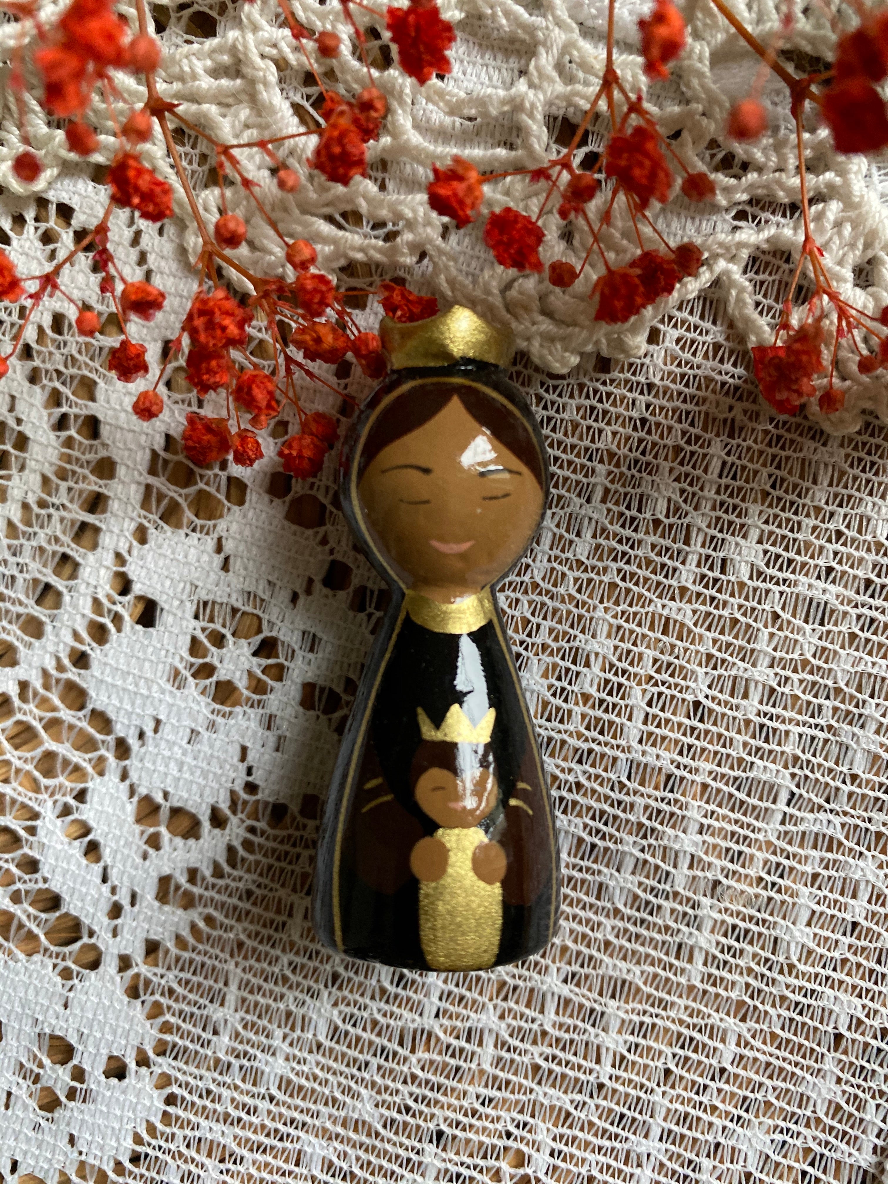 Statue de poche en bois